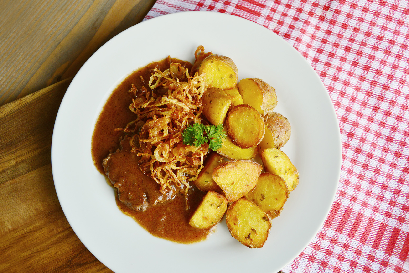 Zwiebelrostbraten Fleischk nner